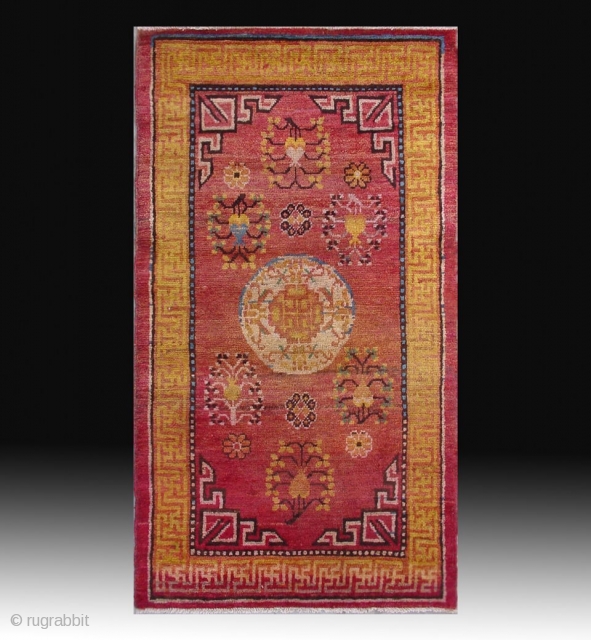 No.D001 * Chinese Khotan Antique Rug .Origin: Xinjiang-Khotan. Shape: Rectangle.Age: 19th/20th Century.Size:76x137cm(2'6"x4'8").Background Color:Reds,
It features a single central medallion which appears to be the stylized combination of a pomegranate (the symbol of male  ...