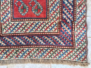 Description and origin: Caucasian carpet with a simple and attractive "Gendje". With a red relatively narrow main field made of ten "Boteh" designs, a comb and an S motif.
Rare triple border with  ...