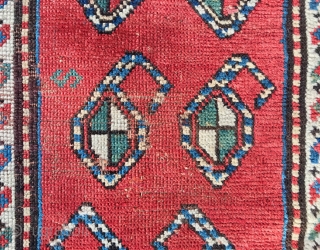Description and origin: Caucasian carpet with a simple and attractive "Gendje". With a red relatively narrow main field made of ten "Boteh" designs, a comb and an S motif.
Rare triple border with  ...