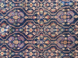 Description and origin: Caucasian carpet with an original geometric border and a main field composed or repetitive floral design.

Age: anterior to 1950.

Dimensions: 187 cm X 132 cm.

Condition: overall good condition. Low pile.  ...