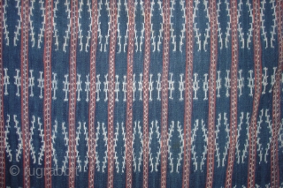 Savu Ikat Selimut (Indonesia: Lesser Sunda Islands) Handsome rendering of diamond pattern in medium rough handspun cotton with natural dyes. Roughly 40"x70" plus fringes. Mid 20th century or older. One small dime  ...