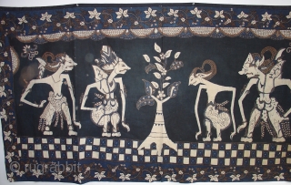 Handsome Wayang Batik from Java: Circa 1925. Good condition with a couple of small holes and light fading on one side. Deep indigo.          