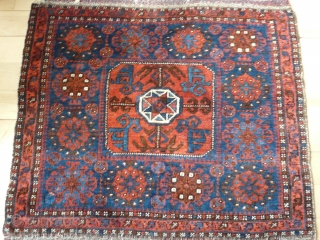 Fine Belouchi Bagface, 19th century, 73cm x 70cm 2'4" x 2'3". This bag has wonderful wool and good colour. Interesting 'totemic' motifs in central cartouche. Generally very good condition. The pile is  ...