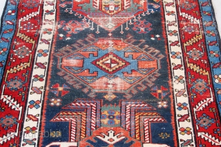 Just in! 19th century North-west Persian runner. 4.00m x 1.05m  (13' x 3'6"). Really good colours, and strong design. Archaic drawing of the medallions. Note also how each medallion is different!  ...