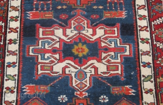 Just in! 19th century North-west Persian runner. 4.00m x 1.05m  (13' x 3'6"). Really good colours, and strong design. Archaic drawing of the medallions. Note also how each medallion is different!  ...