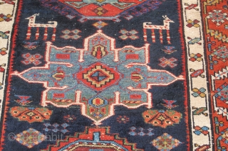 Just in! 19th century North-west Persian runner. 4.00m x 1.05m  (13' x 3'6"). Really good colours, and strong design. Archaic drawing of the medallions. Note also how each medallion is different!  ...