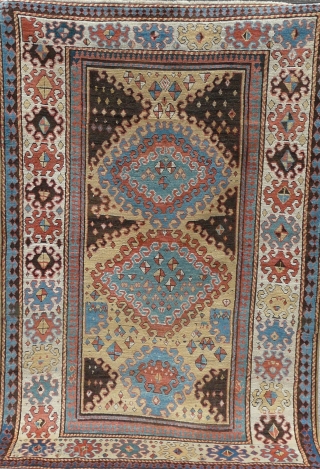 Rare Borjalou Kazak rug, 196cm x 135cm (6'5" x 4'4", circa 1875. An exceptional example. Typical use of repeating hooked lozenges, but filled with very unusual scattered kites! Lovely palette with a  ...