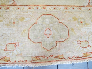 Very pale antique Borlu carpet with Angora wool, 4.54m x 3.50m. Some old repairs, but still very decorative.               