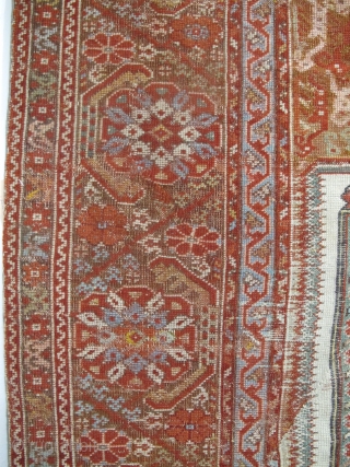 Giordes Prayer Rug, 1.71m x 1.28m, circa 1700, or earlier. Beautifully drawn elements, the design is perfectly balanced. Rare white field, funky spandrels and a really pretty main border. Note the lazy  ...