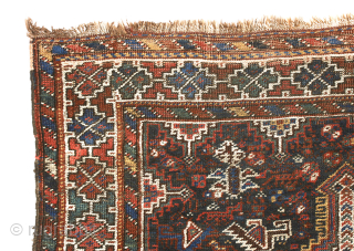 Khamseh rug, first quarter 20th century, 260 x 103 cm (102” x 40,5”)
South Persia Tribal

A rug woven by members of the Khamseh Arab tribe, with the classic line of medallions enclosed by  ...