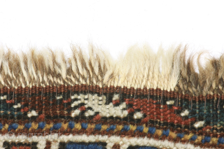 Khamseh rug, first quarter 20th century, 260 x 103 cm (102” x 40,5”)
South Persia Tribal

A rug woven by members of the Khamseh Arab tribe, with the classic line of medallions enclosed by  ...