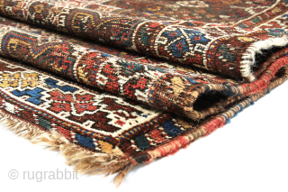 Khamseh rug, first quarter 20th century, 260 x 103 cm (102” x 40,5”)
South Persia Tribal

A rug woven by members of the Khamseh Arab tribe, with the classic line of medallions enclosed by  ...