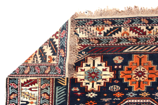 Antique Kuba long rug. Dated 1.904 (AH 1322),  375 x 135cm ( 101,5”x 66”).  
CAUCASIAN
 
This carpet features the appealing “Keyhole Design”. Two of the so-called ‘carnation’ borders, typical of  ...