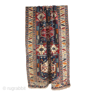 Antique Kuba long rug. Dated 1.904 (AH 1322),  375 x 135cm ( 101,5”x 66”).  
CAUCASIAN
 
This carpet features the appealing “Keyhole Design”. Two of the so-called ‘carnation’ borders, typical of  ...