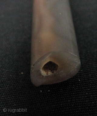 

Long cylindrical tapered agate bead circa 6th to 9th CE, from Cambodia. It has a clean break and should be able to be repaired with a silver collar or a bit of  ...