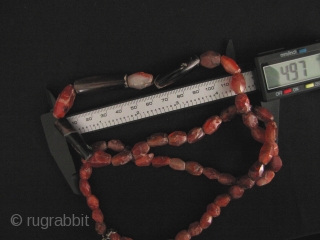 
Nice strand of Bronze Age, circa 2000 to 3000 year old, faceted and totally tubular agate beads. These were excavated from Sukhothai Province in north central Thailand, please see enlargements for scale  ...