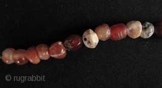 Nice strand of Kushan/Bactrian of mixed stone (mostly carnelian) beads. I acquired these along with coins dating from 1st- 4th CE from the same site in North West Pakistan, so these can  ...