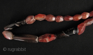 
Nice strand of Bronze Age, circa 2000 to 3000 year old, faceted and totally tubular agate beads. These were excavated from Sukhothai Province in north central Thailand, please see enlargements for scale  ...