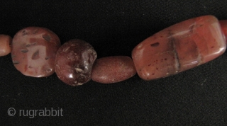 Nice strand of Kushan/Bactrian of mixed stone (mostly carnelian) beads. I acquired these along with coins dating from 1st- 4th CE from the same site in North West Pakistan, so these can  ...