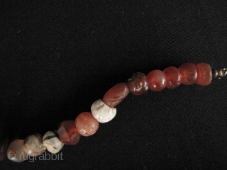 Nice strand of Kushan/Bactrian of mixed stone (mostly carnelian) beads. I acquired these along with coins dating from 1st- 4th CE from the same site in North West Pakistan, so these can  ...