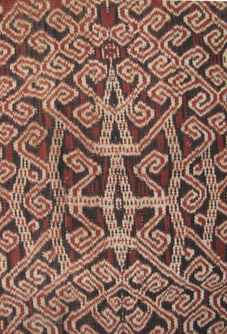 

Outstanding Iban woman’s skirt depicting hawks flying over the forest. The contrast between the black and brown on the background really conveys the interplay of light and shadow as seen up through  ...