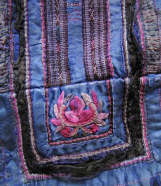 Dong Women’s Jacket: Women’s jacket from the Dong minority in Longsheng Terraces, Guangxi Zhuang, China. The black outer cloth is commercial denim, the lining is handmade indigo cotton with beautiful purple hand  ...