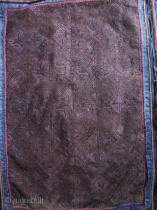 Dong Women’s Jacket: Women’s jacket from the Dong minority in Longsheng Terraces, Guangxi Zhuang, China. The black outer cloth is commercial denim, the lining is handmade indigo cotton with beautiful purple hand  ...
