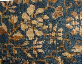 China Rug: Beijing/Tianjin carpet circa 1910, with floral design throughout. Worn down to the warp and weft in many places but no big tears and the selvedge seems to be complete and  ...