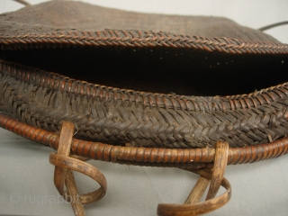 India, Himalayas: Fine and rare old rattan “tali” basket with a contracted mouth from the Idu Mishmi ethnic group of Arunachal Pradesh, India. In India they are primarily animist but in China  ...