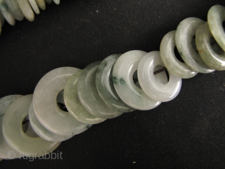 100 Jade Bi: One hundred antique perforated untreated Jadeite discs, circa 1880 to 1950. These were acquired from a Hong Kong jade dealer going out of business due to the ever increasing  ...