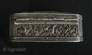 Sri Lankan: Very fine 19th century repoussé and deeply chased Ceylonese sterling silver quality jewelry box in classic Kandyan style with floral scrolls, “Hathsa” Sacred Buddhist Goose and Sinhalese lion images. Excellent  ...