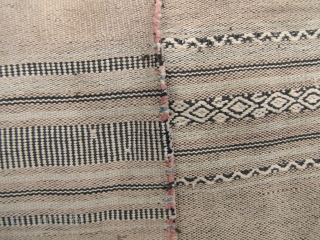 Semi antique woman’s sarong from the Stieng/Xtiêng ethic group Vietnam. Over 60 years old, this is woven from all handspun cotton threads. There is one ink stain and a small hole (see  ...