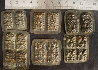 Buddhist Charms: Quirky and eclectic collection of 35 small repousse auspicious good luck tokens. These were collected in Dali, Yunnan, China in the late 1980s. No two are exactly alike and they  ...