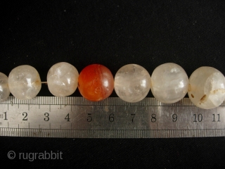 


South East Asian: Fine strand of quartz crystal beads (and a few carnelians) excavated from the Tak Burial site near Mae Sot along the Thai/Burmese border. These can be reliable dated to  ...