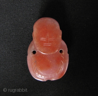 Five Qing Dynasty red agate/carnelian pieces carved into babies and bats- beautiful natural stone and classic Qing carving. These were originally meant to be sewn onto clothing or a hat. A few  ...
