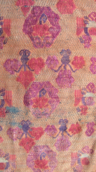 Chinese: Fine old silk brocade supplementary weft embroidered on cotton backing from the Mulao ethnic group, from Guizhou or Guangxi Zhuang, circa early 20th CE with phoenix and floral pattern. L: 109cm/42in  ...