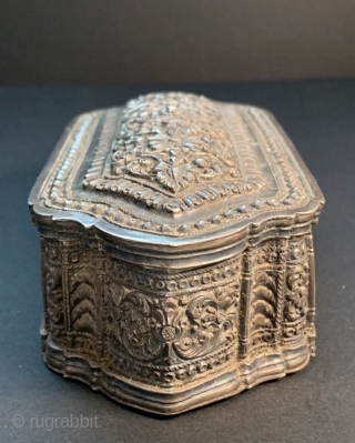 
Fine and elegant 19th century Sri Lanka repoussé and chased silver box. Excellent condition, except a few tiny dents on the bottom edges.  L: 14.2cm/5.6in x W: 4.2cm/1.6in x H: 6.2cm/2.4in.

http://www.abhayaasianantiques.com/items/1449233/Sri-Lanka-Silver-Trinket-Box

 