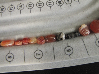 Etched Carnelian Beads: Loose strand lot of mixed etched and faceted beads from what is now Pakistan. I bought these along with a group of Bactrian and Kushan coins so these come  ...