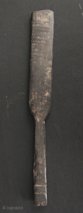 Iban Pottery Mold: Rare and unusual Iban pottery pattern paddle carved from durable Iron Wood, circa 19th century. The pattern on this would be pressed into unfired clay pots to give it  ...