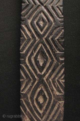 Iban Pottery Mold: Rare and unusual Iban pottery pattern paddle carved from durable Iron Wood, circa 19th century. The pattern on this would be pressed into unfired clay pots to give it  ...