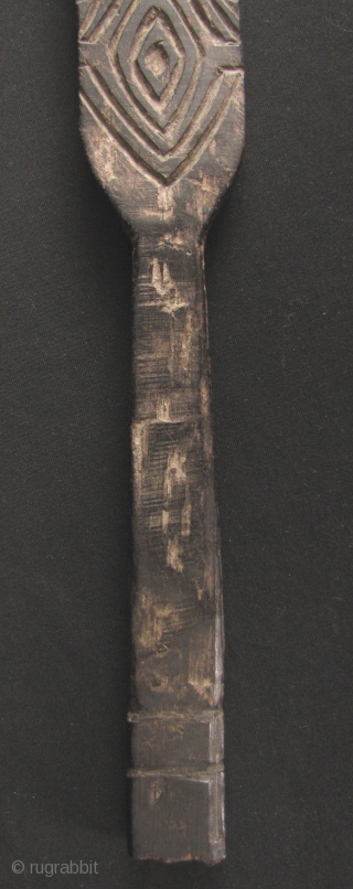 Iban Pottery Mold: Rare and unusual Iban pottery pattern paddle carved from durable Iron Wood, circa 19th century. The pattern on this would be pressed into unfired clay pots to give it  ...