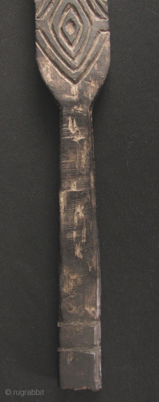 Iban Pottery Mold: Rare and unusual Iban pottery pattern paddle carved from durable Iron Wood, circa 19th century. The pattern on this would be pressed into unfired clay pots to give it  ...