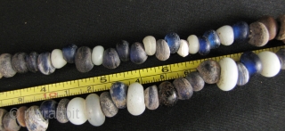 Ming Dynasty Glass Beads: Strand of Yuan/Ming Dynasty glass trade beads excavated from the Tak Hilltop burial site along the Thai Burmese border. These are datable to the 14th to 16th CE,  ...