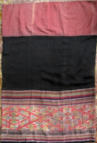 Tai Dam Skirt: Lovely vintage, wearable woman’s dress from the Tai Dam ethnic group Vietnam. The “waist band” is all hand woven cotton cloth, while the black central panel is black raw  ...