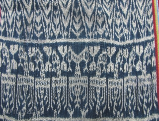 Beautiful West Timor (most likely Isana), Indonesia, three paneled, ikat blanket. This is woven from a combination of natural dyed home spun cotton and commercial thread. The blue ikat bands are made  ...