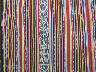 Beautiful West Timor (most likely Isana), Indonesia, three paneled, ikat blanket. This is woven from a combination of natural dyed home spun cotton and commercial thread. The blue ikat bands are made  ...