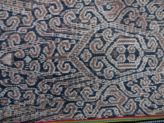 Iban woman’s kain skirt from Sarawak depicting the tree of life with bamboo running the length of the bidang. There is some fraying on the selvedge, and a seamless repair noted in  ...