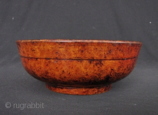 Sino Tibetan Lacquer Bowl: Nice old wood bowl from circa late 19th to early 20th century- some losses to the lacquer but otherwise good condition. D: 16.3cm/6.4in an H: 6.4cm/2.5in

http://www.trocadero.com/stores/abhayaasianart/items/1370339/item1370339store.html
   