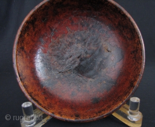 Sino Tibetan Lacquer Bowl: Nice old wood bowl from circa late 19th to early 20th century- some losses to the lacquer but otherwise good condition. D: 16.3cm/6.4in an H: 6.4cm/2.5in

http://www.trocadero.com/stores/abhayaasianart/items/1370339/item1370339store.html
   