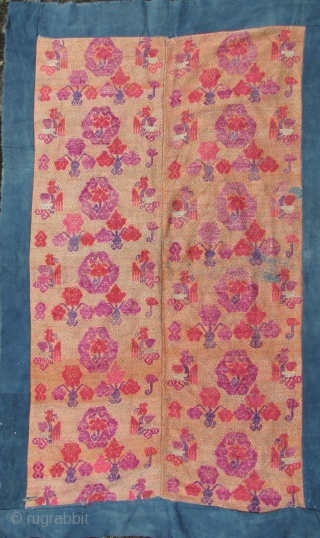 Chinese Wedding Blanket: Fine old silk brocade supplementary weft embroidered on cotton backing from the Mulao ethnic group, circa first half 20th CE. The foundation is woven with handspun blue cotton threads  ...